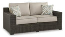 Coastline Bay Outdoor Loveseat with Cushion - Vida Furniture (Laredo,TX)