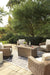 Beachcroft Beachcroft Fire Pit Table with Four Nuvella Swivel Lounge Chairs - Vida Furniture (Laredo,TX)