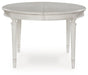 Montelaine Dining Extension Table - Vida Furniture (Laredo,TX)