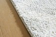 Unawick Medium Rug - Vida Furniture (Laredo,TX)