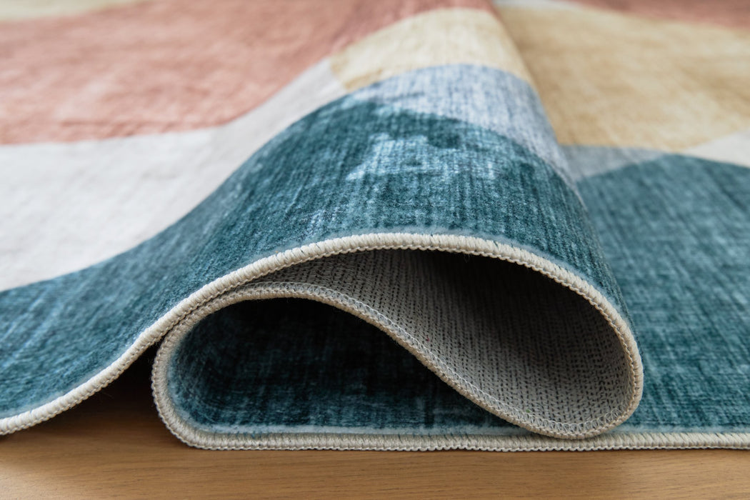 Chanleigh Washable 7'6" x 9'6" Area Rug - Vida Furniture (Laredo,TX)