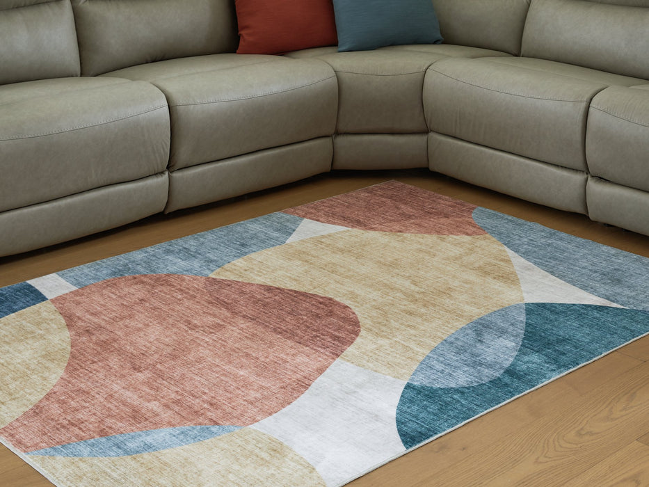 Chanleigh Washable 5' x 7' Area Rug - Vida Furniture (Laredo,TX)