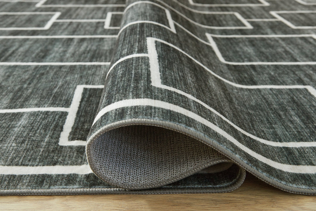 Elderland Washable Area Rug - Vida Furniture (Laredo,TX)