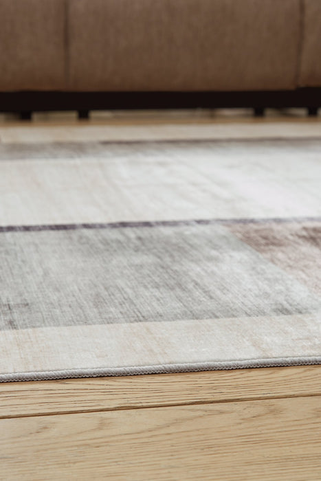 Larkport Washable Area Rug - Vida Furniture (Laredo,TX)