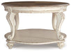 Realyn Coffee Table - Vida Furniture (Laredo,TX)