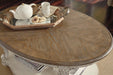 Realyn Coffee Table - Vida Furniture (Laredo,TX)